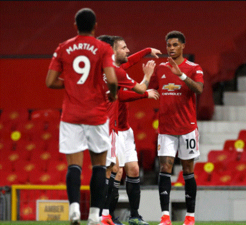 Marcus Rashford fêtant son but avec ses coéquipiers